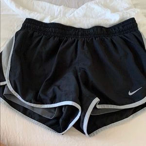 Black Nike shorts with spandex liner